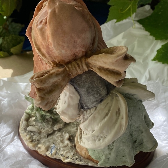 Whimsical Ceramic Girl Sculpture with Pink and Green Details - Picture 5 of 13